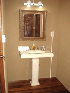 Yes, there's a sink next to the bathroom